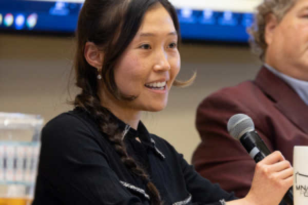 Manci Li, a graduate student in the Comparative and Molecular Biosciences program at the College of Veterinary Medicine, answers a question from an audience member. 